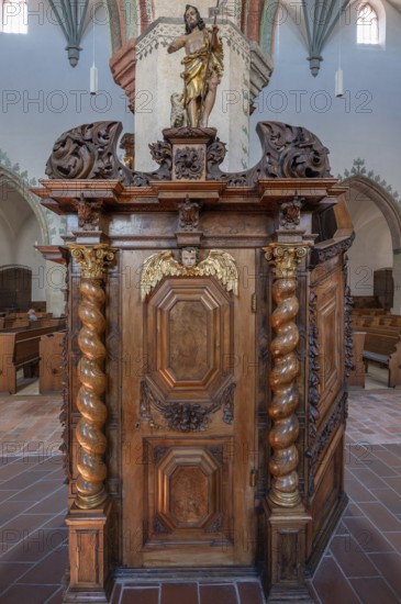 Figure of Jesus with the Lamb of God on the chancel entrance in the church of St Martin, Memmingen, Bavaria, Germany, Europe