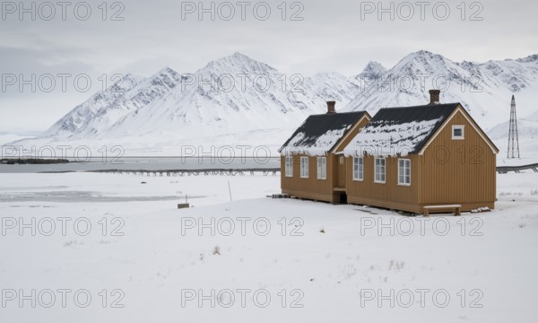 Ochre-coloured houses, research settlement, scientific settlement, wintry mountain landscape, Ny-Ålesund, Kongsfjord, Spitsbergen Island, Svalbard and Jan Mayen archipelago, Norway, Europe