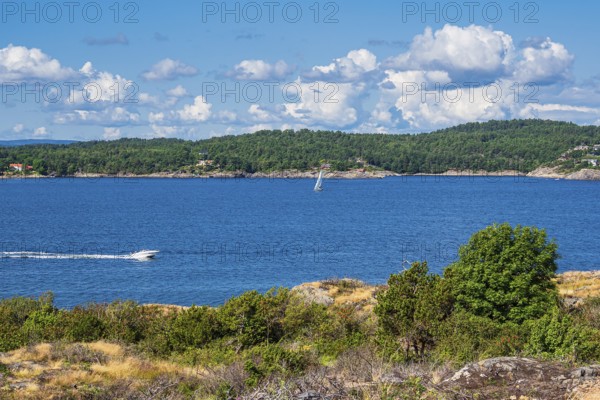 Landscape with boats on the island of Merdø in Norway