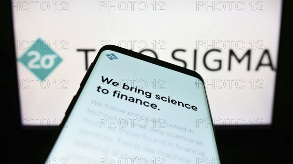 Stuttgart, Germany, 09-04-2022: Smartphone with webpage of American hedge fund company Two Sigma Investments LP on screen in front of logo. Focus on top-left of phone display, Europe