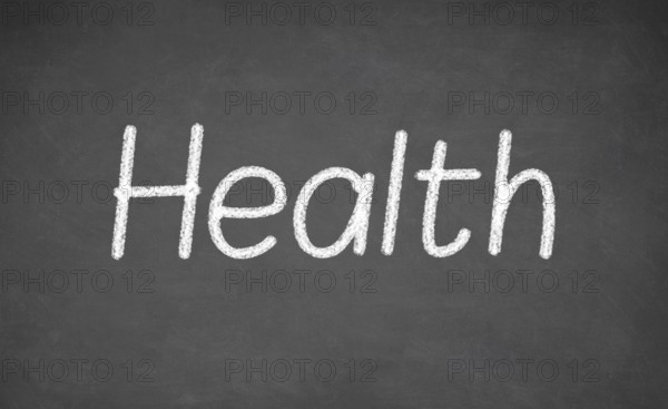 Health lesson on blackboard or chalkboard. written in white chalk