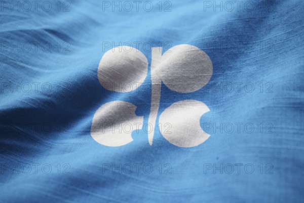 Closeup of Ruffled Organization of the Petroleum Exporting Countries Flag, OPEC Flag Blowing in Wind