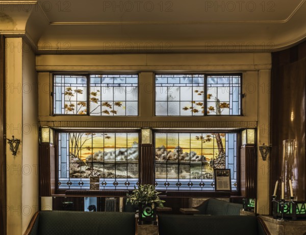 Brussels, Belgium, 01 18 2019: Art deco interior design of the tavern L'Espérance with stained glass and old furniture, Europe