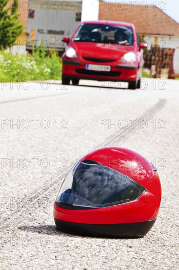 An accident involving a motorbike. Traffic accident with skid mark on road Symbol photo. Austria