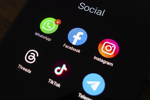 May 5, 2024, Brazil. In this photo illustration social networks (WhatsApp, Facebook, Instagram, Threads, TikTok and Telegram) logos seen displayed on a smartphone