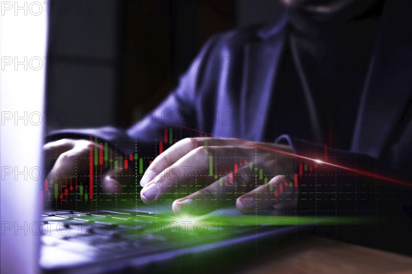 Businessman using computer with stock market virtual increasing stock market graph chart. Business investment profit and deposit dividend saving growth in 2024 concept.