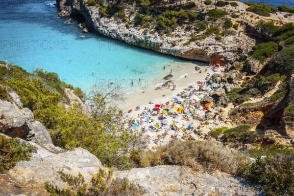 Calo des Moro, Mallorca on a sunny day with people on the beach