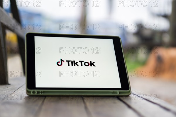 Tik Tok logo on smartphone