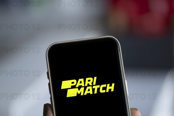 Dhaka, Bangladesh- 23 Nov 2024: Parimatch logo is displayed on smartphone. Parimatch is an international sports betting company.