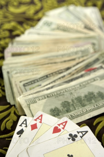 Dollar notes and poker cards, gambler tools recreation