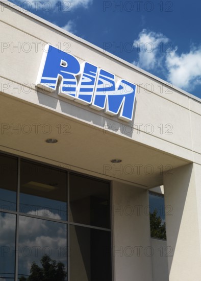 RIM sign on Research in Motion company headquarters building against blue sky. Waterloo, Ontario, Canada, North America