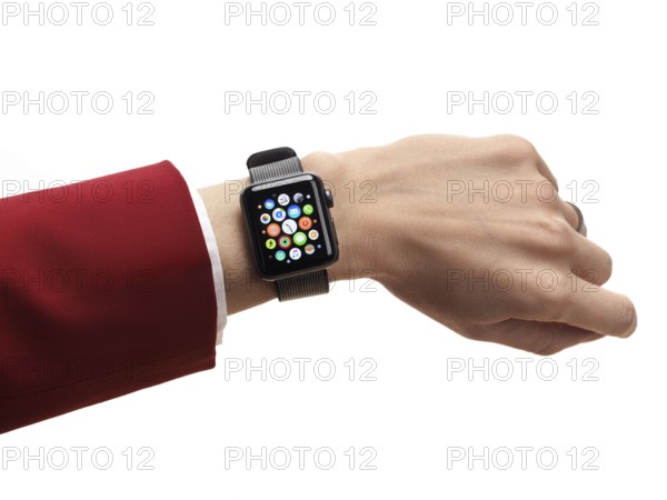 Woman hand with Apple Watch series 2 smartwatch on her wrist displaying app icons isolated on white background