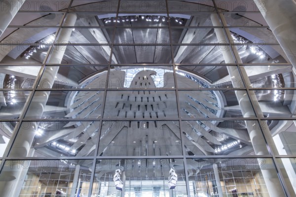 Federal Eagle in the Reichstag, Berlin, Germany, Modern glass façade with reflections and symmetrical architecture, illuminated in urban style, Reichstag Berlin, Europe