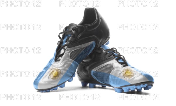 The Argentine flag painted on football boots. Isolated on white background