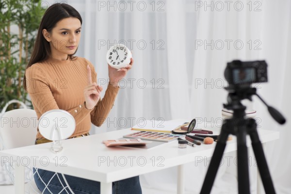 Woman doing commercial with clock