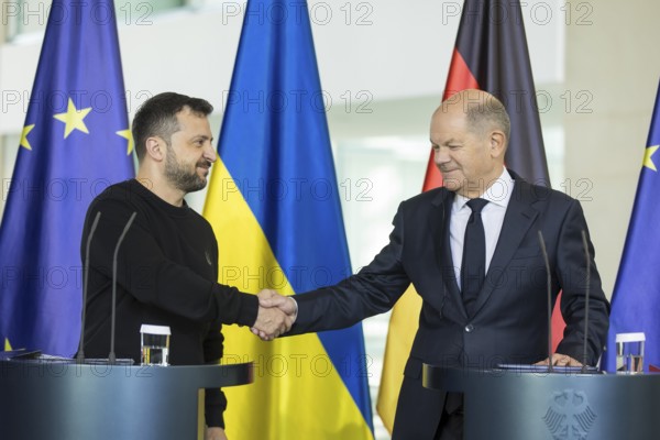 Volodymyr Zelensky (President of Ukraine) and Olaf Scholz (Chancellor of the Federal Republic of Germany) give a press statement at the Federal Chancellery, 11 October 2024