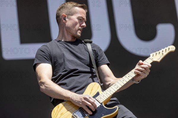 Adenau, Germany, 9 June 2024: H-Blockx (Tim Tinte Humpe, guitarist) play at Rock am Ring. The festival takes place at the Nürburgring race track near the town of Adenau from 7 to 9 June 2024, Europe
