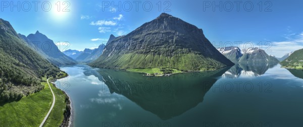 Panorama aerial view of fjord Hjorundfjord, from village Øye (left) to Urke (right), Mt. Stalbergneset (middle), Norway, Europe
