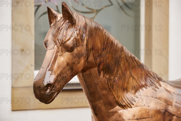 Head of a bronze horse sculpture in the city of horses Warendorf, district of Warendorf, North Rhine-Westphalia, Germany, Europe