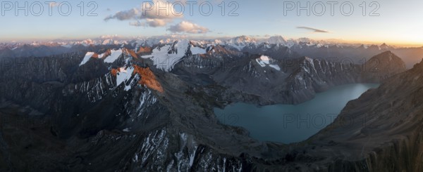 Evening mood, mountain panorama, aerial view, 4000 metre peak with glacier, mountain pass and mountain lake Ala-Kul Lake, Tien Shan, Kyrgyzstan, Asia