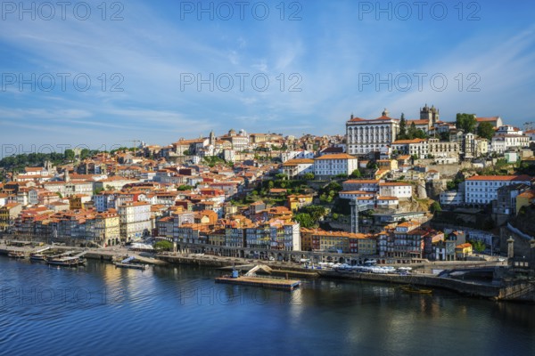 View of Porto city and Douro river from famous tourist viewpoint Miradouro da Serra do Pilar on sunset. Porto, Vila Nova de Gaia, Portugal, Europe