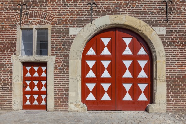 Historic moated castle, Renaissance Raesfeld Castle, façade with one Tor tor and one door, Freiheit Raesfeld, Münsterland