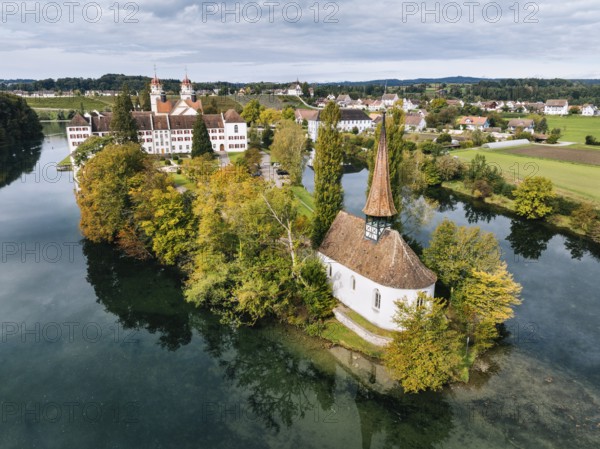 Aerial view of the former Benedictine abbey with the monastery church of St Mary and the pointed church of St Magdalena on the Rhine island of Rheinau, Andelfingen, Canton Zurich, Switzerland, Europe