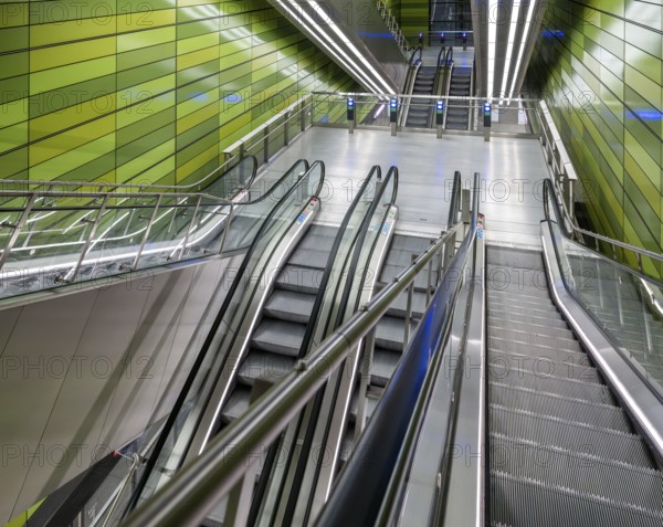Modern metro station with smooth green walls and escalators, Frederiksberg Allé metro station, Copenhagen, Denmark, Europe
