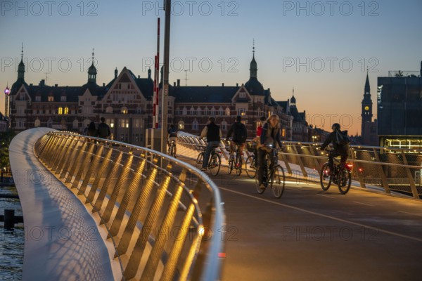 Cyclists on the Lille Langebro cycle and pedestrian bridge over the harbour, Copenhagen is considered the cycling capital of the world, 45% of the population travel by bike, Denmark, Europe