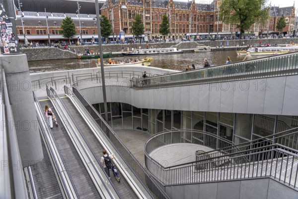 New bicycle car park at Amsterdam Central Station, Stationsplein, space for around 7000 bicycles, largest in Amsterdam, digitally monitored, underground, direct connection to the station and metro, Netherlands, escalators lead to the bicycle garage, Netherlands