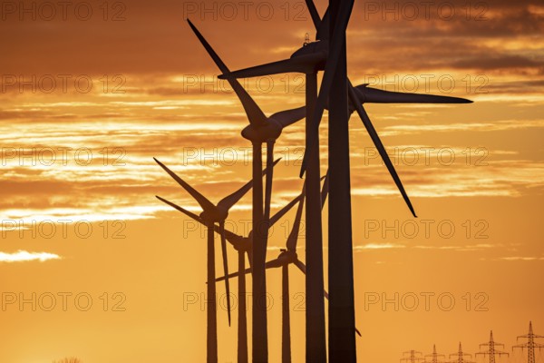 Wind farm near the East Frisian town of Norden, east of the town, sunset, Lower Saxony, Germany, Europe