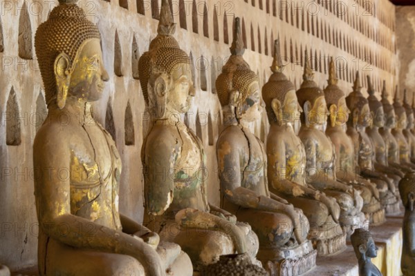 Ancient Buddha statues in the courtyard of Wat Si Saket, Vientiane, Vientiane province, Laos, Asia