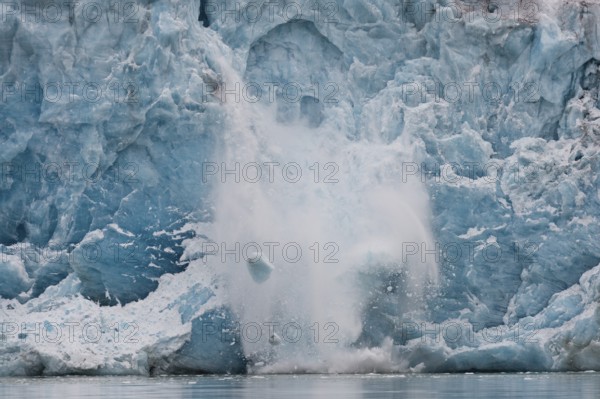 Calving glacier, edge of Monacobreen, Liefdefjord, Woodfjord area, Spitsbergen Island, Svalbard and Jan Mayen archipelago, Norway, Europe
