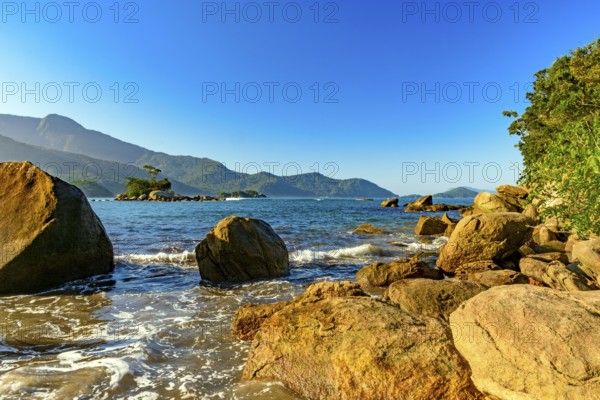 Rocks on Castelhanos Beach on the island of Ilhabela in Sao Paulo coast, Castelhanos beach, Ilhabela, Sao Paulo, Brazil, South America