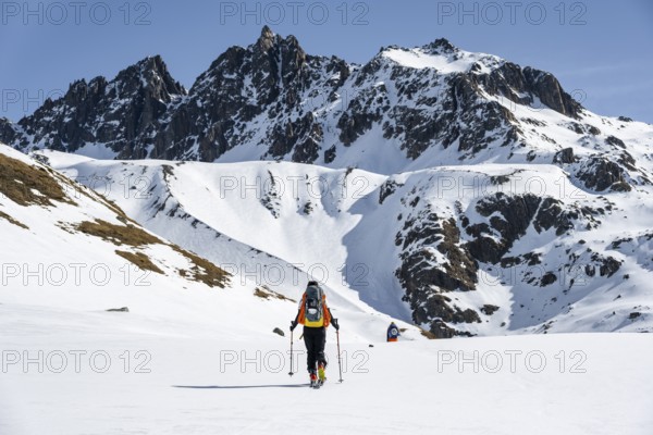 Ski tourers on the Graubünden Haute Route, Snow-covered mountains, Winter in the Albula Alps, Graubünden, Switzerland, Europe