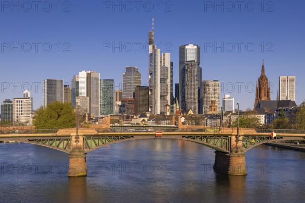 The sun shines on the skyscrapers of Frankfurt's banking skyline in the morning, Frankfurt am Main, Hesse, Germany, Europe