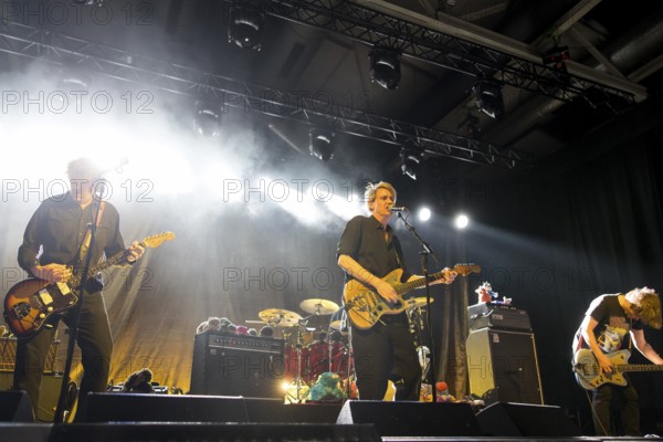 Dirk von Lowtzow (singer and guitarist), Arne Zank (drummer) and Jan Müller (bassist) from Tocotronic live on Golden Years Tour 2025 in Berlin's Columbiahalle on 19 April 2025