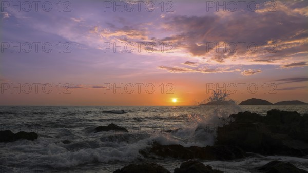 Mazatlan beaches, sunsets and scenic slow motion ocean swells and waves near Malecon sea promenade