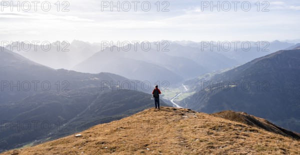 Mountaineers in front of a mountain panorama on the Venet, view of the Upper Inn Valley in the morning light, Venet crossing, Ötztal Alps, Tyrol, Austria, Europe