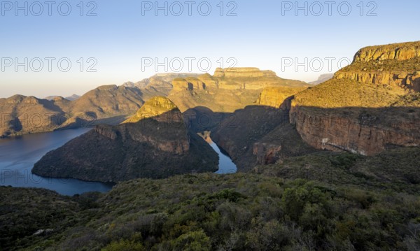 Sunset at Blyde River Canyon with Three Rondawels peak, view of canyon with Blyde River and Mesa Mountains in the evening light, canyon landscape, Panorama Route, Mpumalanga, South Africa, Africa