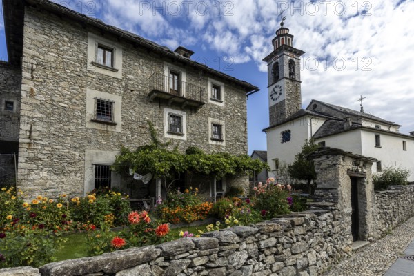 View of the village, typical Ticino stone houses in the mountain village of Rasa, Centovalli, Canton Ticino, Switzerland, Europe