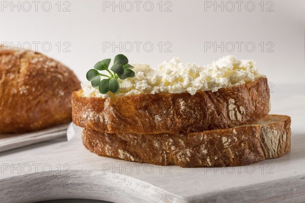 Sandwich, with cream cheese, homemade, on a cutting board, rustic style, no people, selective focus, breakfast