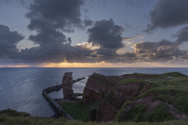 Evening shot, Lange Anna Felsen, red sandstone cliff, Lummenfelsen, cloudy sky, Helgoland Oberland, Helgoland, Schleswig-Holstein, Germany, Europe