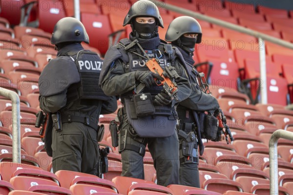 Baden-Württemberg police anti-terror exercise in the stadium. In the run-up to the European Football Championships, 1200 police officers rehearse for an emergency. Scenario: stabbing in the stands of the MHP Arena, VfB Stuttgart's stadium, which is also the venue for five European Championship matches. After initial treatment by the police, the handover of the injured to the emergency services and fire brigade was also rehearsed. Stuttgart, Baden-Württemberg, Germany, Europe