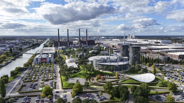 Volkswagen plant and the Autostadt car towers, Wolfsburg, 29.09.2024. The Volkswagen Group has announced cost-cutting measures for its German plants, Wolfsburg, Lower Saxony, Germany, Europe