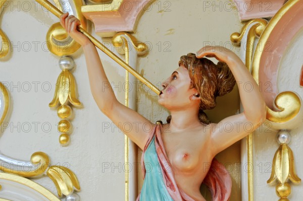 Wooden figure, colourfully painted, woman blowing fanfare, bosom free, old Hooghuys organ on carousel, fairground organ, historic Oktoberfest, Oktoberfest, Munich, Upper Bavaria, Bavaria, Germany, Europe