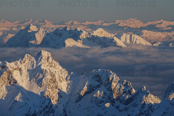 Mountain peak above high fog, evening light, winter, view from Zugspitze to Dreitorspitze and Karwendelgebir, Upper Bavaria, Bavaria, Germany, Europe