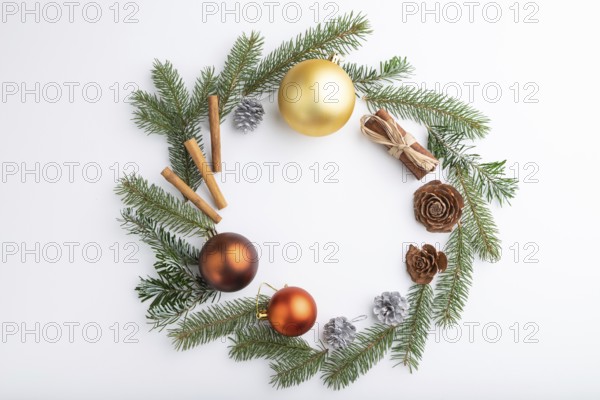 Christmas or New Year wreath composition. Decorations, balls, cones, fir and spruce branches, on white background. Top view, copy space, flat lay