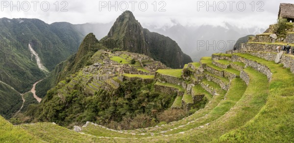 Panoramic view of Machu Picchu, with Huayna Picchu at the background, Machu Picchu, Cusco Region, Peru, South America