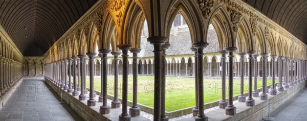 Architecturally elegant cloister with central garden courtyard, Le Mont-Saint-Michel